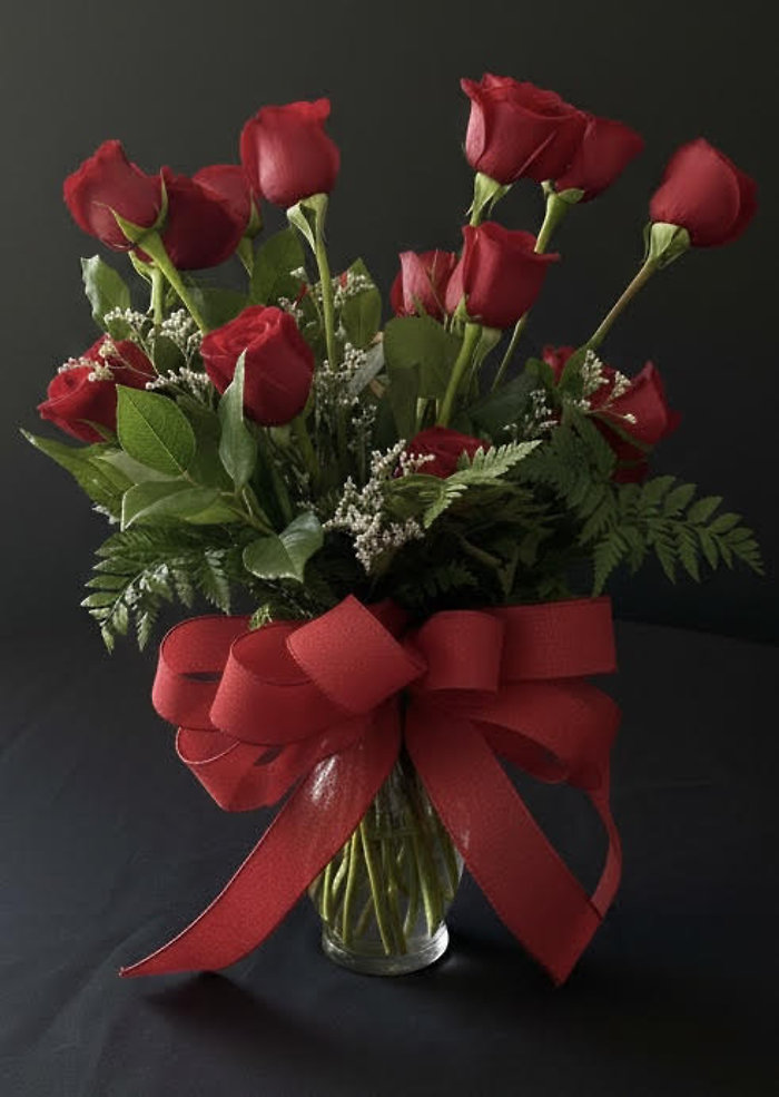 One Dozen Red Roses with Greenery in a Vase