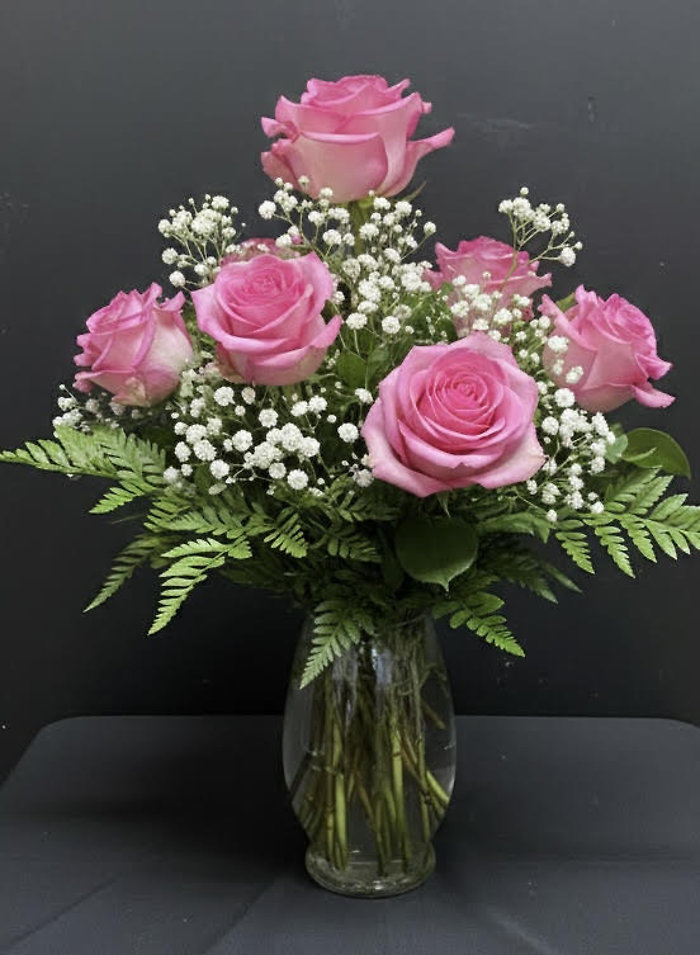 Half Dozen Pink Roses with Greenery in a Vase